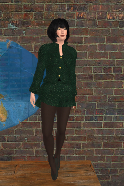 Me doing an Irish dance on the bar counter of Gulliver's, wearing a green jacket over a black top, a short green skirt, black nylon tights and black flats.