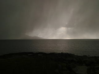 Foto ansehen Rainy clouds kissing the fjord