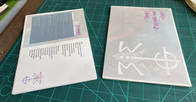 Two piles of printed papers next to each other. Their format now is A5. Two piles of printed papers next to each other. Their format now is A5.