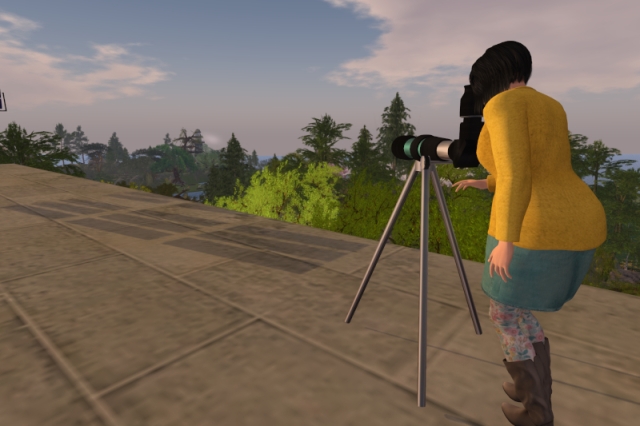 Beholding the landscape of Novale through an optical tube on Condor Peak