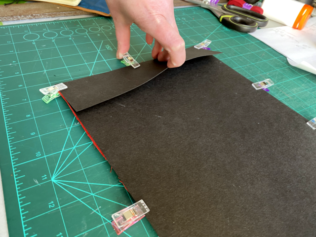 Another view of the inside, a hand pulls up the pocket a little to make it more visible. Another view of the inside, a hand pulls up the pocket a little to make it more visible.