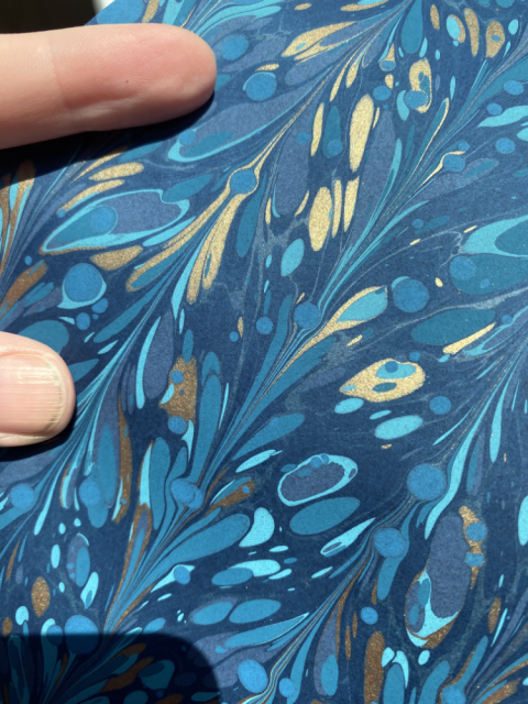 A detail shot of the pattern. The gold shines in the sunlight. A detail shot of the pattern. The gold shines in the sunlight.